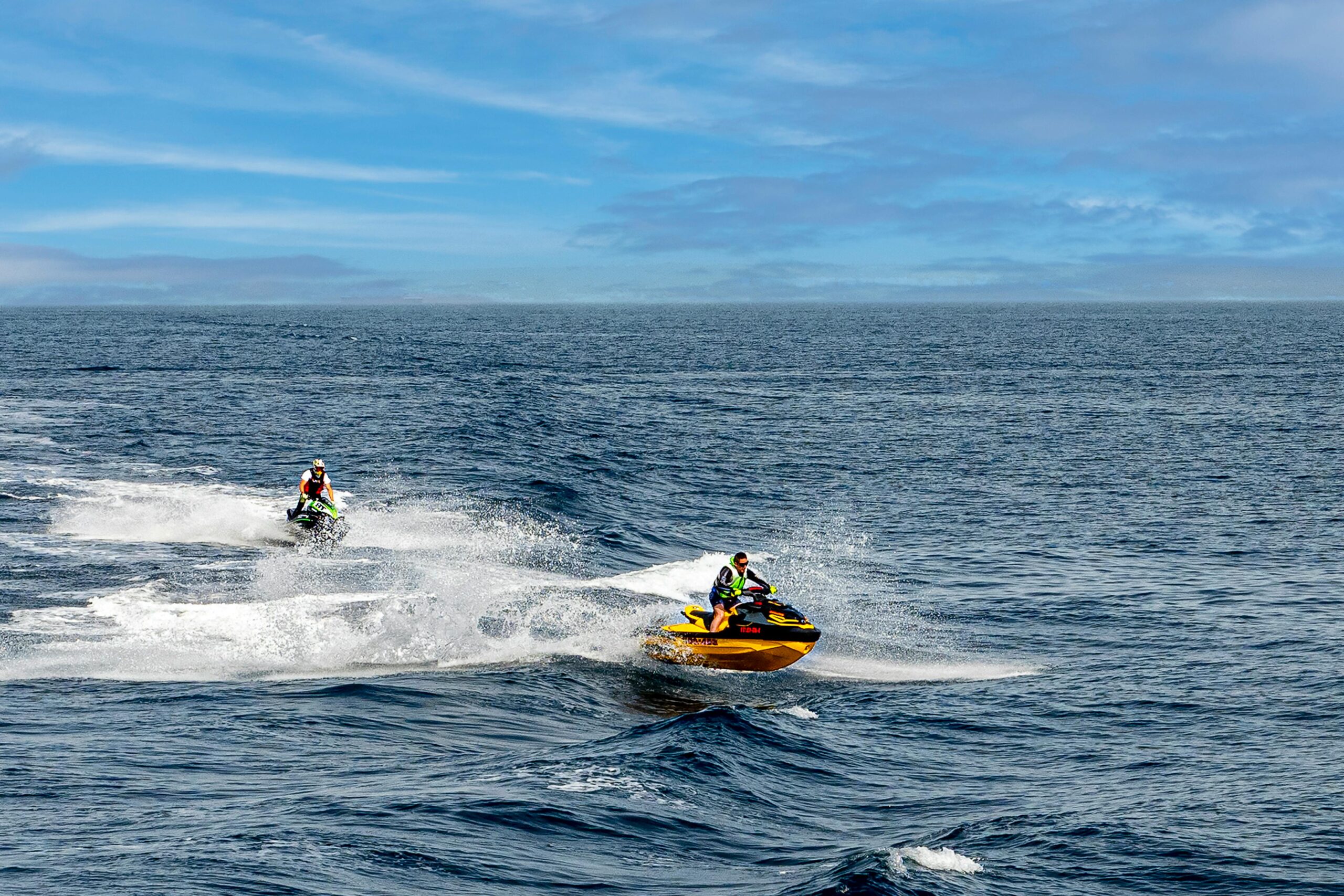Exciting jet ski race across the vibrant Mediterranean Sea, capturing speed and adventure.