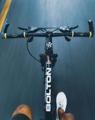POV shot of a cyclist riding through Pune showing motion and adventure.
